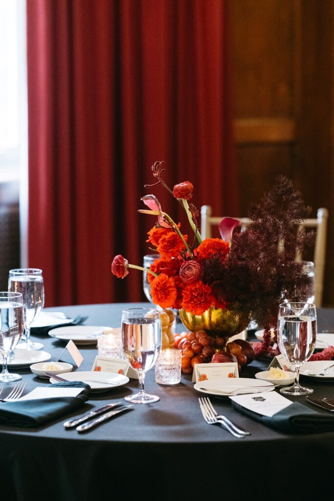 red wedding centerpieces at  Hotel Kansas City's Tudor Ballroom