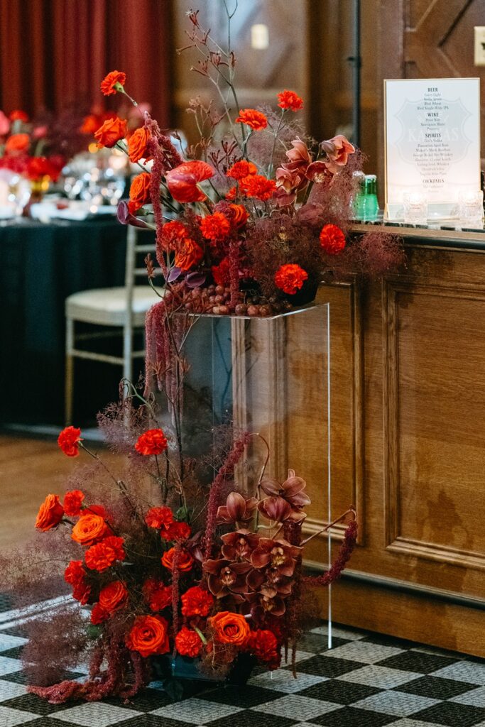 all red floral arrangement wedding reception bar Hotel Kansas City's Tudor Ballroom