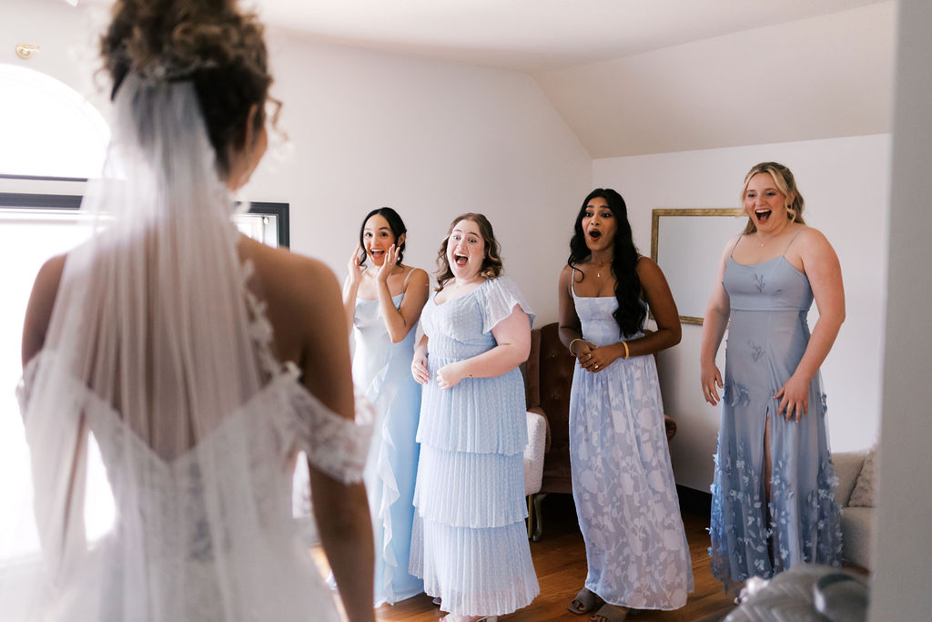 bridesmaids first look at countryside chalet