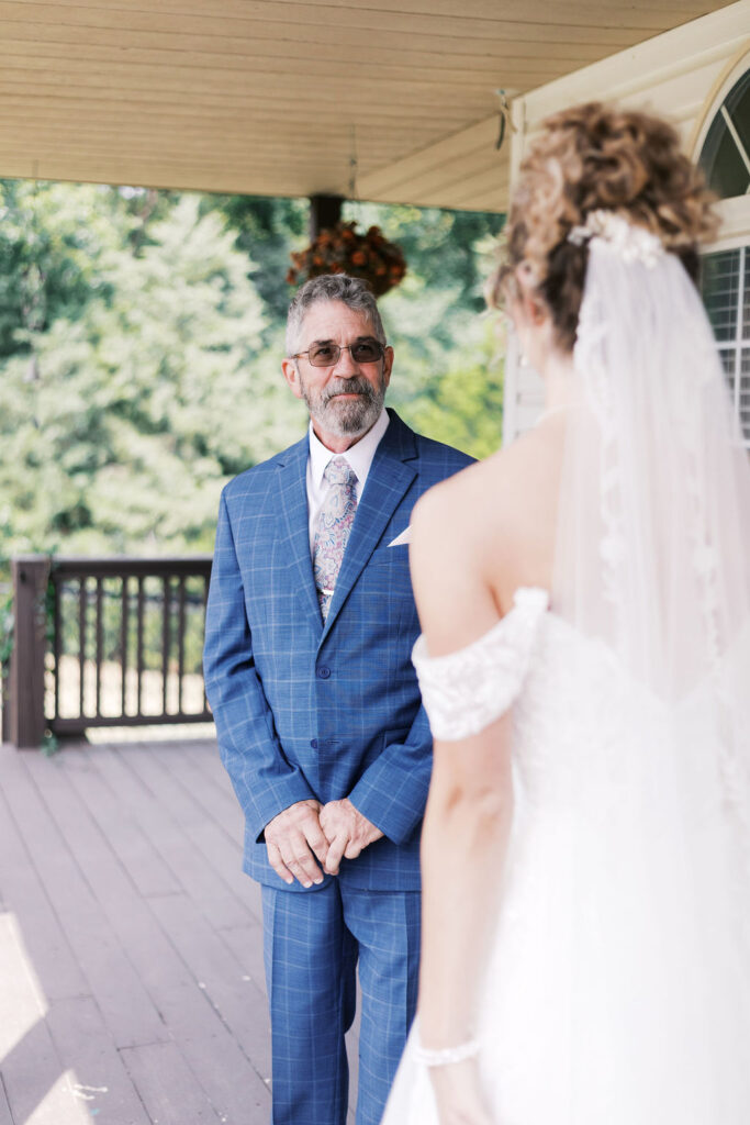 first look with bride and dad at countryside chalet