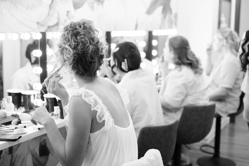 bride and bridesmaids getting ready at countryside chalet