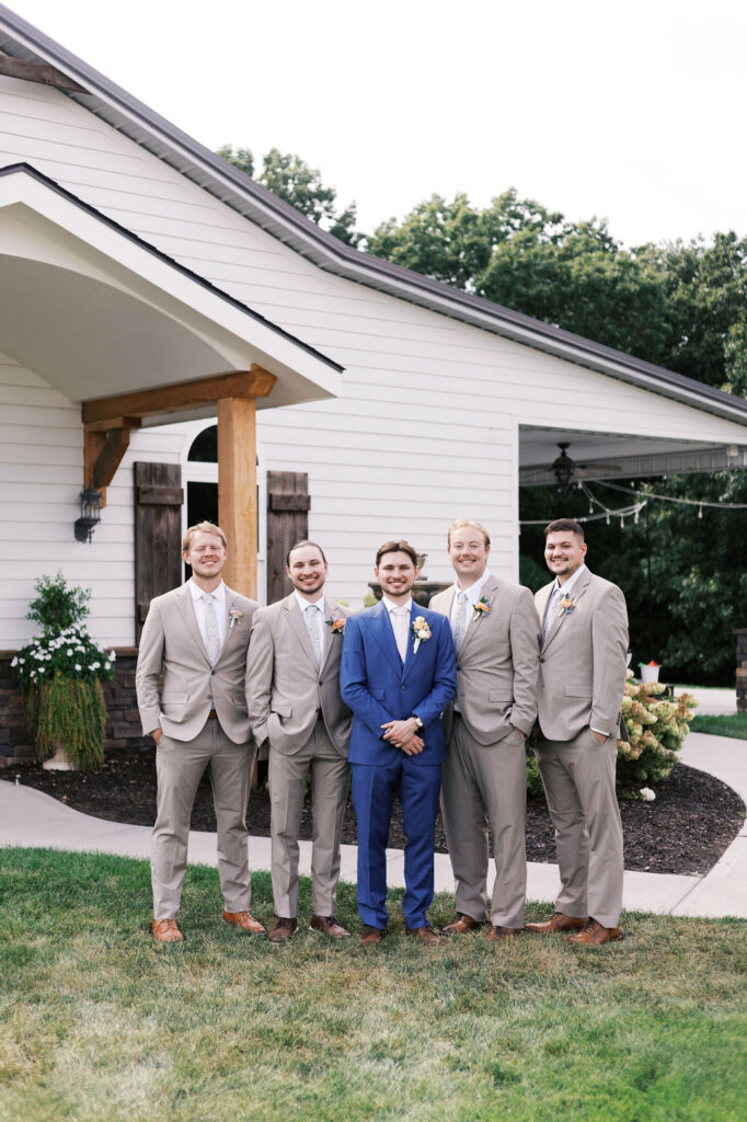 wedding party in from of the countryside chalet pavilion