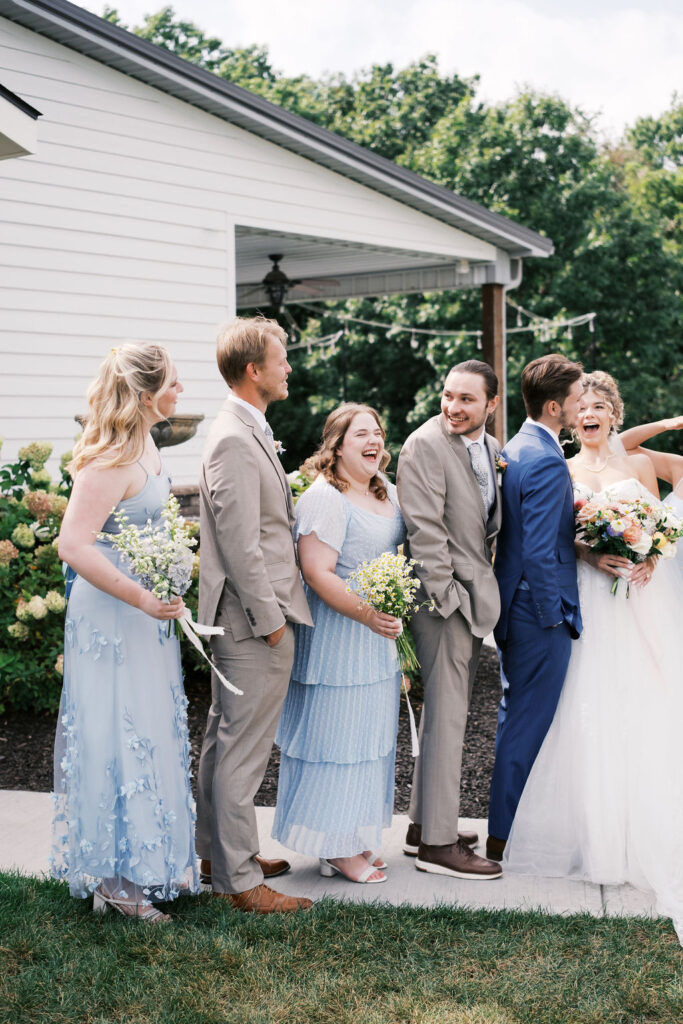 wedding party in from of the countryside chalet pavilion
