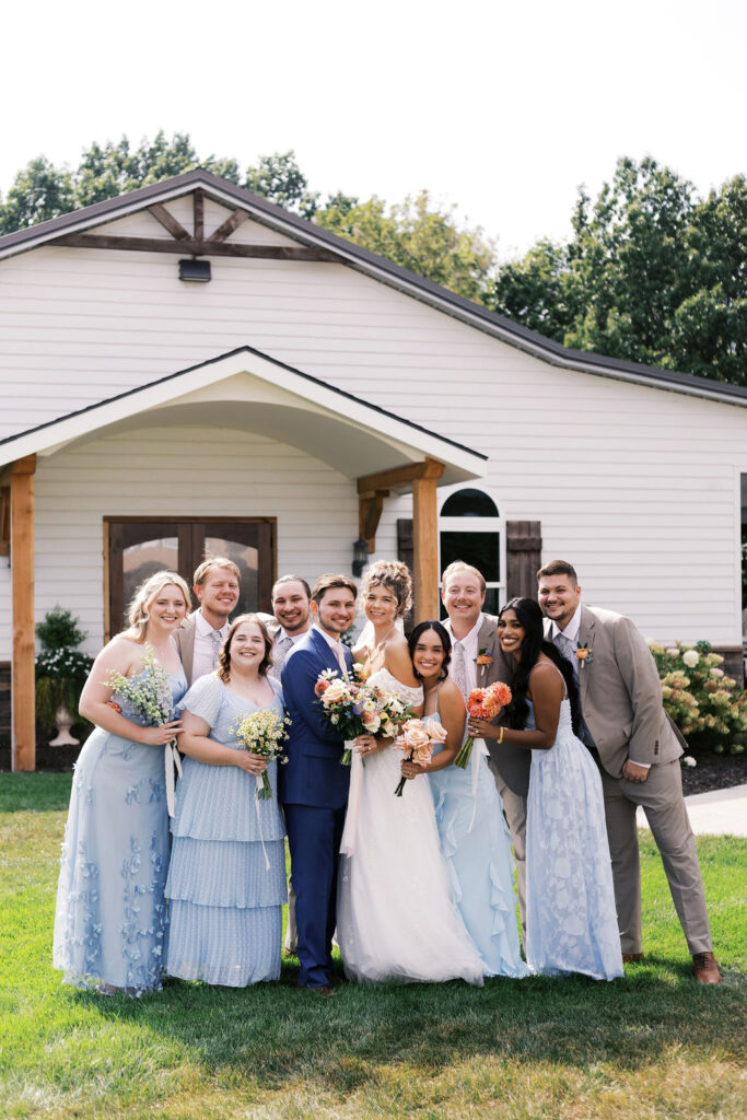 wedding party in from of the countryside chalet pavilion