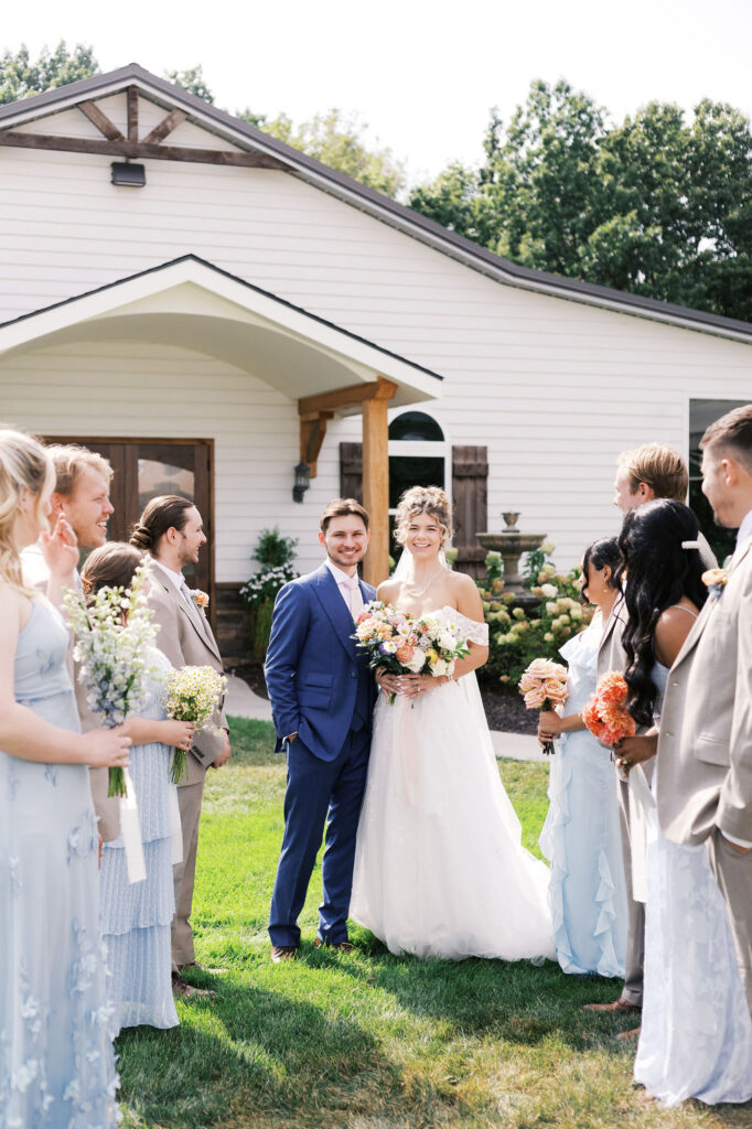 wedding party in from of the countryside chalet pavilion
