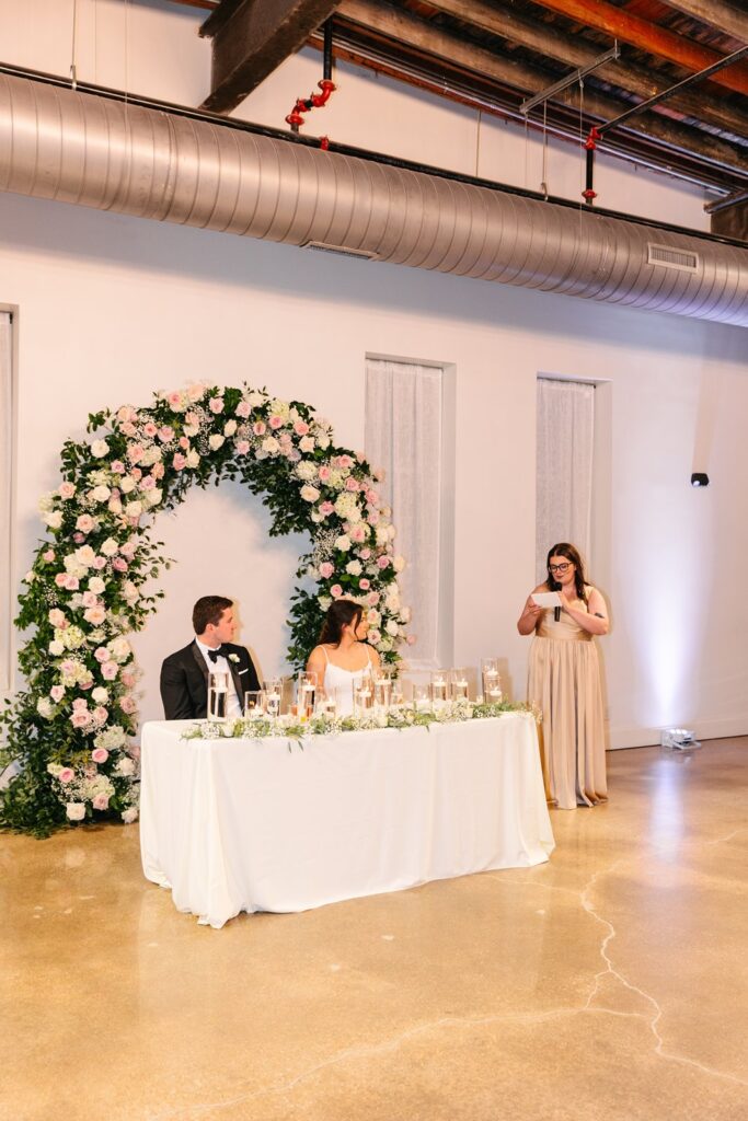 toasts at Stone Manor wedding reception