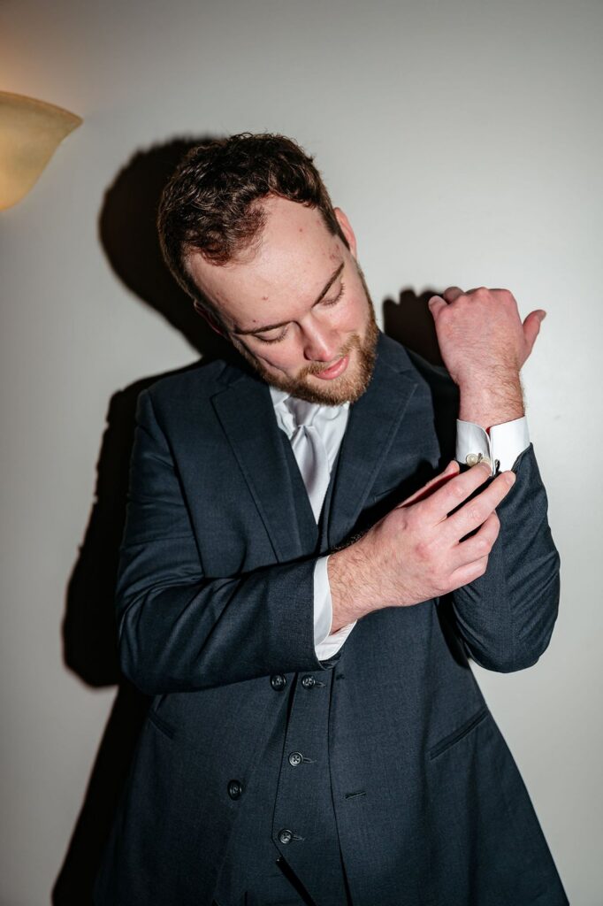 groom getting ready at Mission Theatre