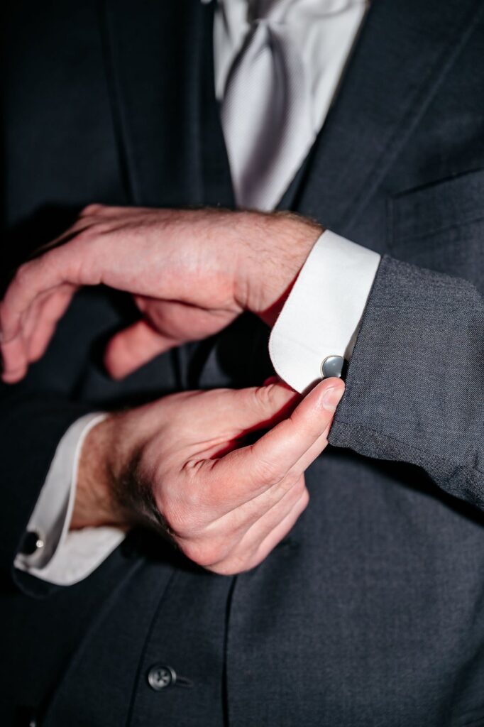 groom getting ready at Mission Theatre