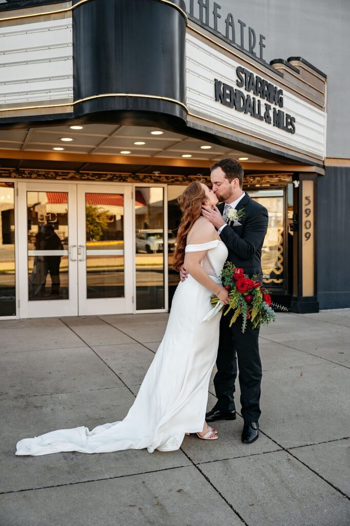 Couples photos outside of Mission Theatre